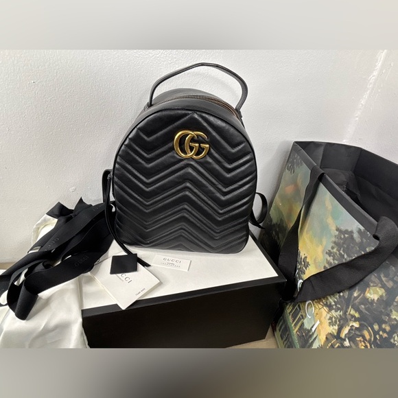 Gucci Handbags - Gucci Black Double G Marmont Mini Backpack with Gold Hardware